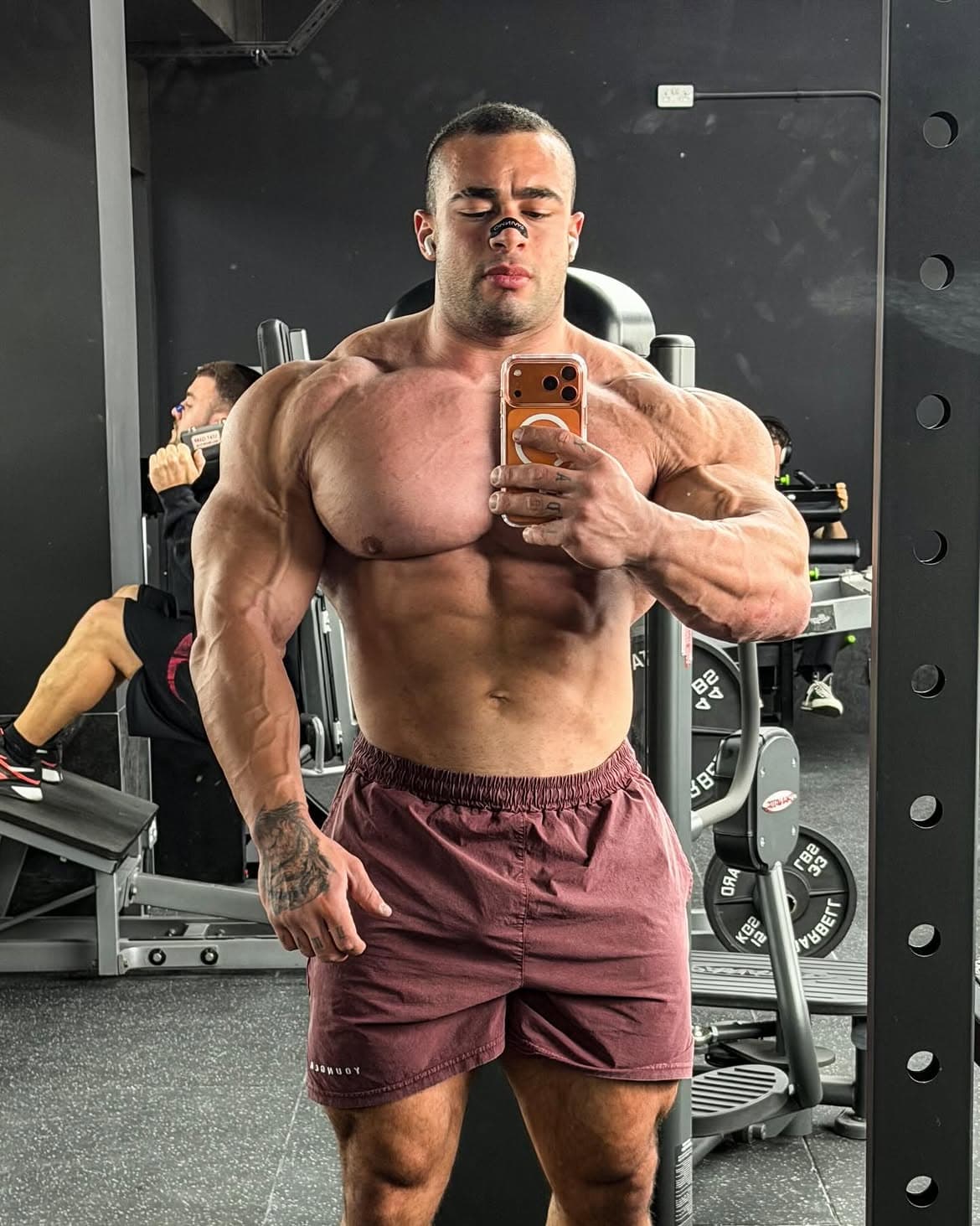 Fitness creator photographing a training update